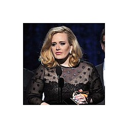 Adele slams weight critics