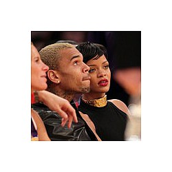 Rihanna and Brown get close at Grammys