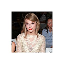 Taylor Swift ‘swept off her feet’