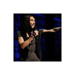 Russell Brand continues divorce silence