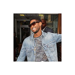 Usher hints at price of fame