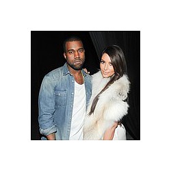 Kim Kardashian and Kanye &#039;in love&#039;