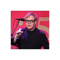 Elton John ‘taking movie plans slowly’