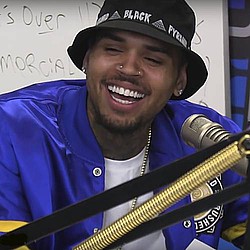 Chris Brown makes homophobic slur against rapper on Twitter