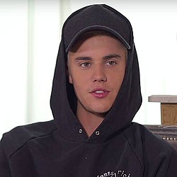 Justin Bieber busked toget money for a holiday with his mum