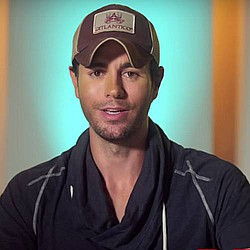 Enrique Iglesias has water-skid naked along the coast of Miami after losing a bet