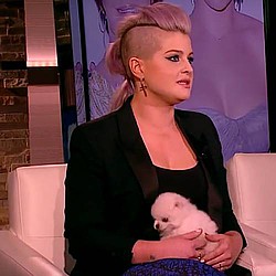 Kelly Osbourne has been left devastated by the death of her beloved dog