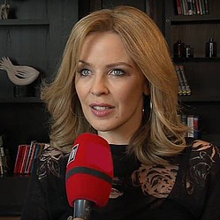 Kylie Minogue feels like her boyfriend&#039;s secretary