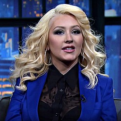 Christina Aguilera denies being responsible for a large bruise on son’s face