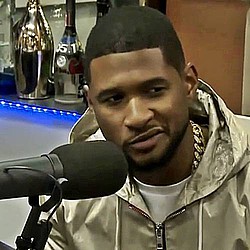 Usher tops US chart