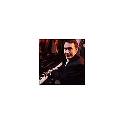 Jools Holland auctions piano