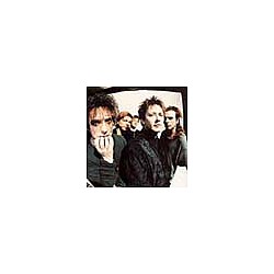 The Cure dump two members