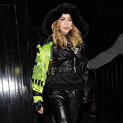 Madonna paints curb grey again after parking row