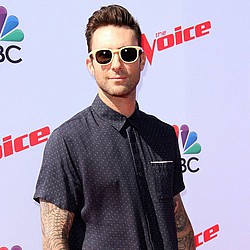 Adam Levine and wife Behati Prinsloo compare baby bumps
