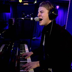 Tom Odell supporting girls education at the Shard for #SheWill