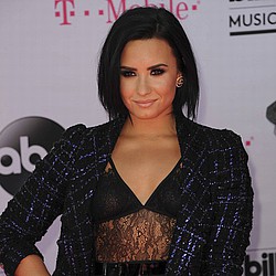 Demi Lovato gives away cat due to allergies