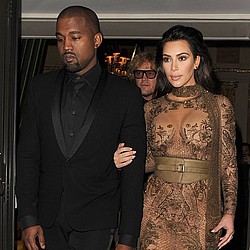 Kanye West and Kim Kardashian &#039;threatening former bodyguard with lawsuit&#039;