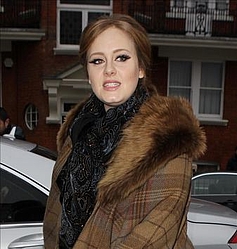 Adele beats Lady Gaga to number one