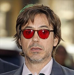 Robert Downey Jr said it will be `weird` to film Iron Man 3 without Jon Favreau