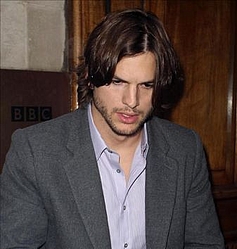 Ashton Kutcher `flew round the world for a hour with Demi Moore`