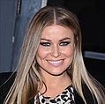 Carmen Electra gets hot under the collar on RuPaul`s Drag Race - After watching one dragster strut her stuff, the Playboy beauty, 38, said: “Yeah, that’s right, big &hellip;