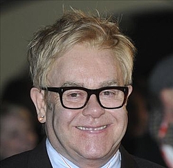 Sir Elton John spoofs Benny Hill in Saturday Night Live promo