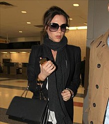 Victoria Beckham `panicking over royal wedding outfit`