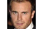Gary Barlow teases his Take That bandmate about his age - The singer &#039; who turned 40 in January &#039; mocks the eldest member of the boy band, Howard Donald, 43 &hellip;
