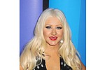 Christina Aguilera pops out of dress - The chart star almost had a wardrobe malfunction as she promoted new TV show The Voice. Her dress &hellip;