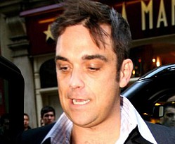 Take That `to sing backing vocals for Robbie Williams`
