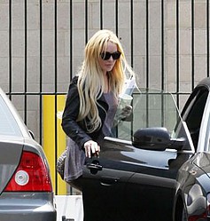 Lindsay Lohan is granted restraining order against alleged stalker