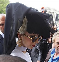 Lady Gaga treats fans to pizza and doughnuts