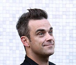 Robbie Williams uses yoga to battle nerves