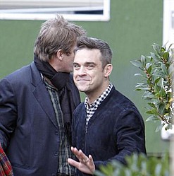 Robbie Williams `hooked on reality TV`