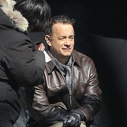 Tom Hanks `was too busy for a mid-life crisis`