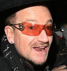 U2 admitted they are `gutted` to delay album until 2012