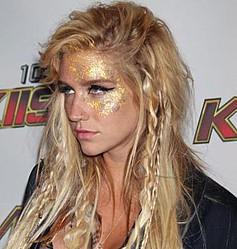 Ke$ha `gave track to Britney to solidify songwriting career`