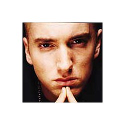 Eminem surprise album to top US chart
