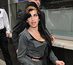 Amy Winehouse manager `retires her from stage`
