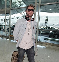 Brian McFadden performs at ... shopping centre
