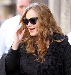 Adele given all-clear to sing again