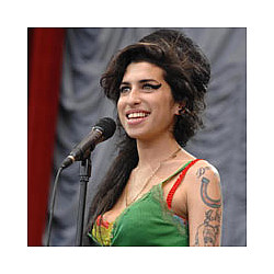 Amy Winehouse Celebrated At Memorial As Fans Are Given Her Clothes
