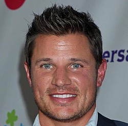 Nick Lachey `doing everything he can` to start a family
