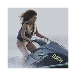 Rihanna Thrills On Jet-Ski As She Continues Break From Loud Tour