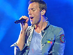 Coldplay Perform New Songs, Thrill Crowd At Lollapalooza