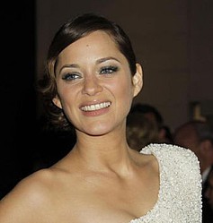 New York woman charged with stalking Oscar winner Marion Cotillard
