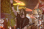 Foo Fighters Cap Lollapalooza In Rocking, Rain-Soaked Set - CHICAGO — For a minute there on Sunday (about 45, actually), it looked like the only people in &hellip;