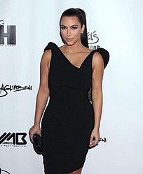 Kim Kardashian `scared of tripping down the aisle`