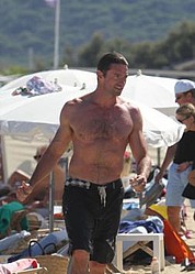 Hugh Jackman only works out because he`s paid to