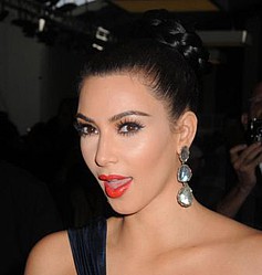 Kim Kardashian takes her wedding ring off to work out